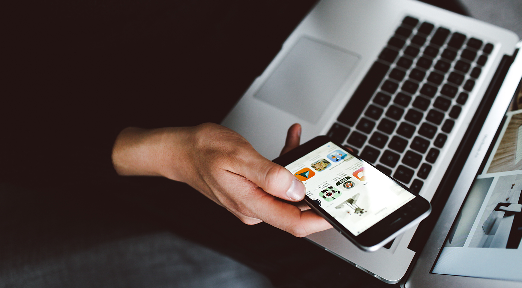 A person with a smartphone in his hands